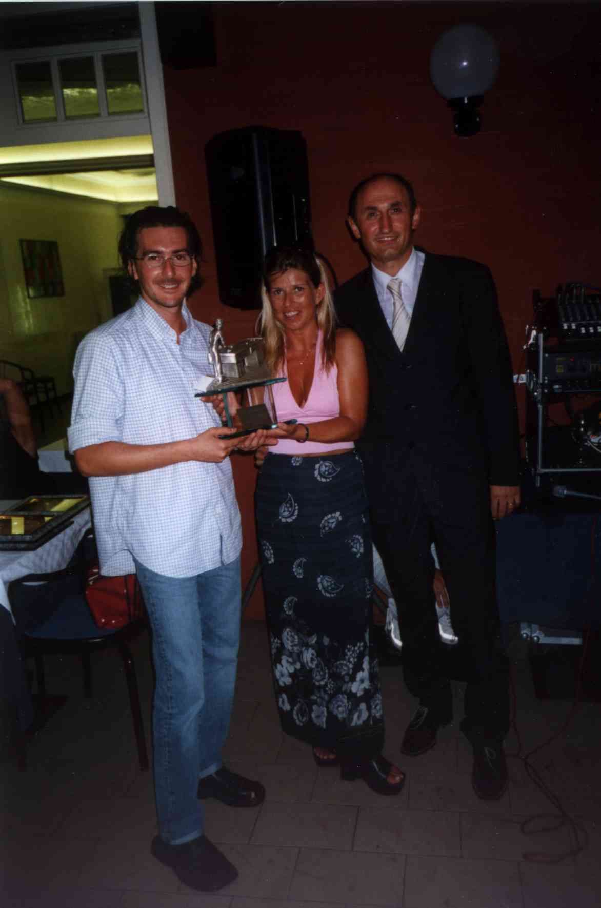 Maurizio Zoffoli vincitore del campionato italiano biathlon nel 2002, con Cristina Lazzarini e Loris De Cesari